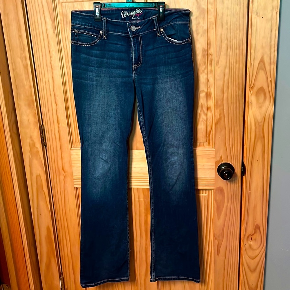 Size 11/12x34 boot cut Wrangler jeans.
